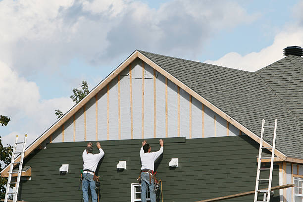 Professional Siding technician working in Halethorpe, MD